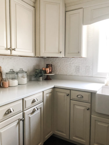 We swapped our granite for these gorgeous white quartz countertops and we LOVE them! #quartzcountertops