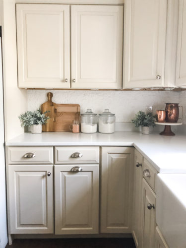 We swapped our granite for these gorgeous white quartz countertops and we LOVE them! #quartzcountertops