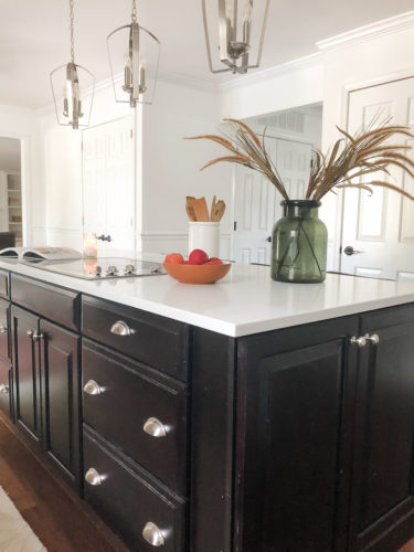We swapped our granite for these gorgeous white quartz countertops and we LOVE them! #quartzcountertops
