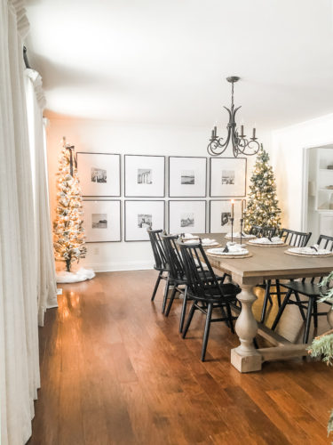 Learn how to get a high end look with a custom gallery wall! You'll learn how to decorate a large wall the easy way! #decoratealargewall #gallerywall
