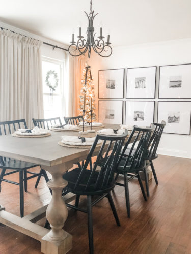 Learn how to get a high end look with a custom gallery wall! You'll learn how to decorate a large wall the easy way! #decoratealargewall #gallerywall