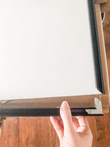 Learn how to get a high end look with a custom gallery wall! You'll learn how to decorate a large wall the easy way! #decoratealargewall #gallerywall