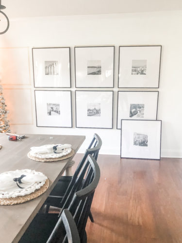 Learn how to get a high end look with a custom gallery wall! You'll learn how to decorate a large wall the easy way! #decoratealargewall #gallerywall