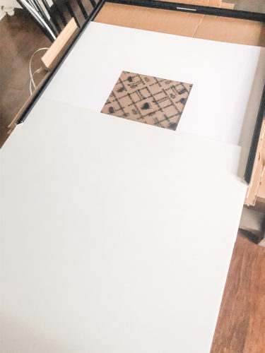 Learn how to get a high end look with a custom gallery wall! You'll learn how to decorate a large wall the easy way! #decoratealargewall #gallerywall