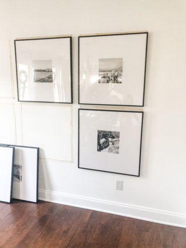 Learn how to get a high end look with a custom gallery wall! You'll learn how to decorate a large wall the easy way! #decoratealargewall #gallerywall