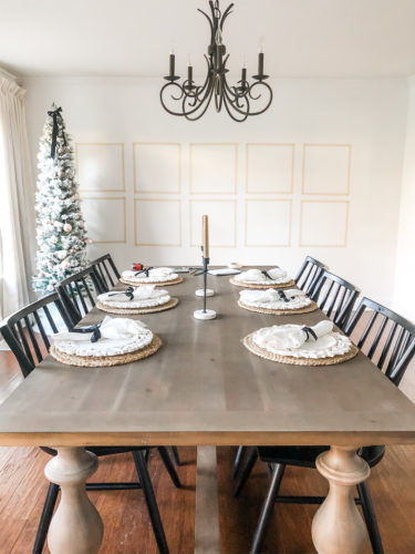 Learn how to get a high end look with a custom gallery wall! You'll learn how to decorate a large wall the easy way! #decoratealargewall #gallerywall