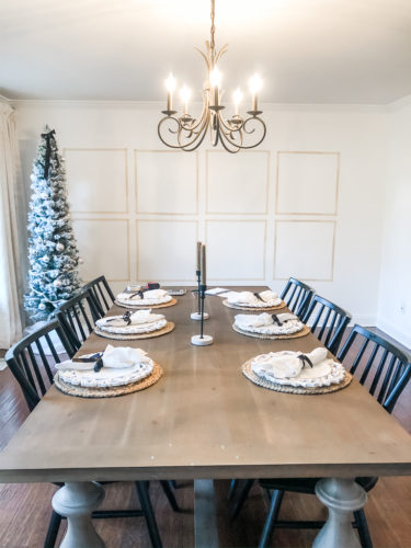 Learn how to get a high end look with a custom gallery wall! You'll learn how to decorate a large wall the easy way! #decoratealargewall #gallerywall
