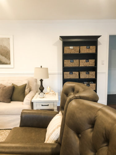 Organize your kids' toys in your living room without sacrificing the esthetic of the room! #organizekidstoys