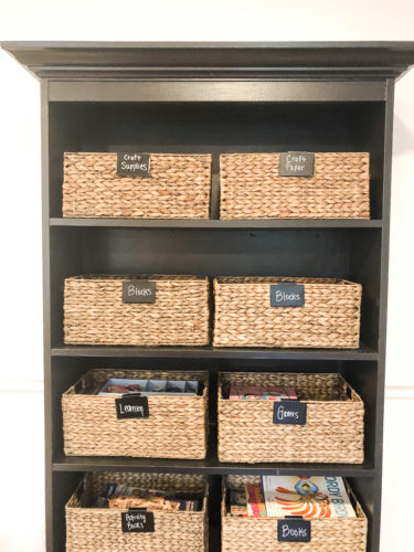 Organize your kids' toys in your living room without sacrificing the esthetic of the room! #organizekidstoys