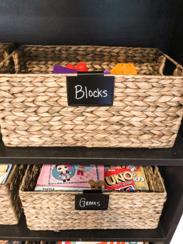 Organize your kids' toys in your living room without sacrificing the esthetic of the room! #organizekidstoys