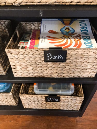 Organize your kids' toys in your living room without sacrificing the esthetic of the room! #organizekidstoys
