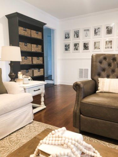 Organize your kids' toys in your living room without sacrificing the esthetic of the room! #organizekidstoys