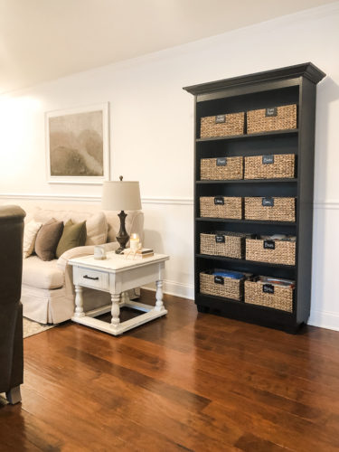 Organize your kids' toys in your living room without sacrificing the esthetic of the room! #organizekidstoys