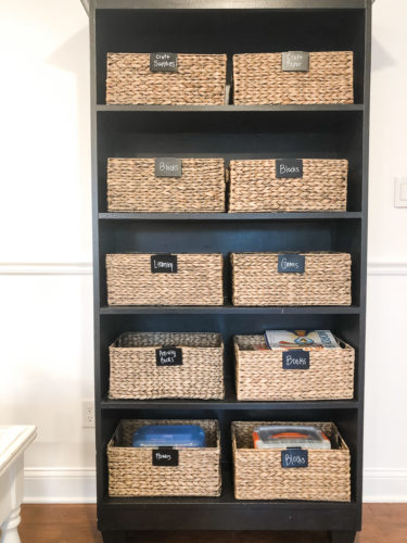 Organize your kids' toys in your living room without sacrificing the esthetic of the room! #organizekidstoys