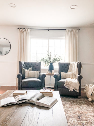 This cozy sitting area makes me want to curl up with a good book and sip a cup of hot tea. #cozysittingarea