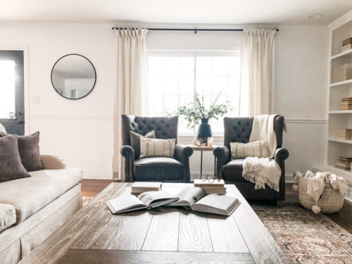 This cozy sitting area makes me want to curl up with a good book and sip a cup of hot tea. #cozysittingarea