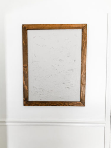 Learn how to make your own expensive-looking textured, abstract wall art. Convert old art paintings into new, modern artwork for your home. This project is super budget-friendly! #DIYWallArt #Abstractarttutorial #texturedwallart #modernart