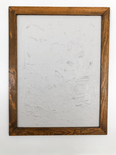 Learn how to make your own expensive-looking textured, abstract wall art. Convert old art paintings into new, modern artwork for your home. This project is super budget-friendly! #DIYWallArt #Abstractarttutorial #texturedwallart #modernart