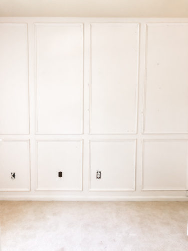 Learn how to install picture frame molding for an accent wall! Measuring tips, spacing, tools you'll need & more. #pictureframemolding #howtoinstallmolding #accentwall #pictureframemoldingaccentwall