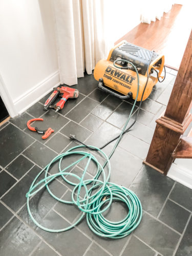 Learn how to install picture frame molding for an accent wall! Measuring tips, spacing, tools you'll need & more. #pictureframemolding #howtoinstallmolding #accentwall #pictureframemoldingaccentwall