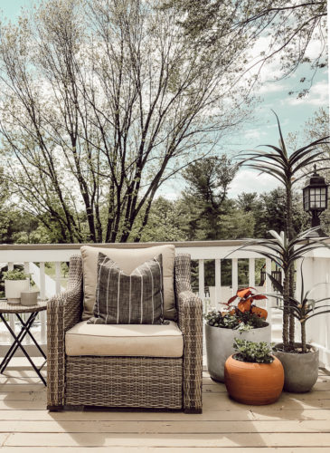 Such a cozy spot with this outdoor chair and beautiful planters.