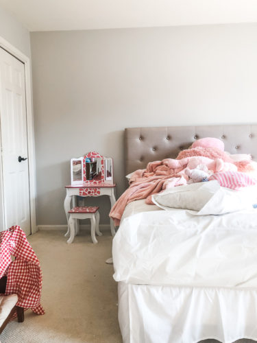 Learn how to paint an arch on a wall in any room for a budget-friendly statement! See how she made a DIY compass to make this large arch look symmetrical. #archonawall