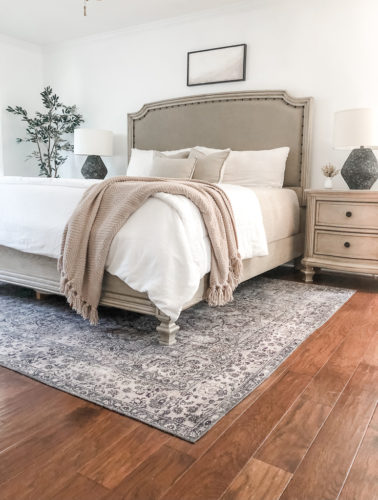 This neutral bedroom is simple yet sophisticated. These lamps & DY artwork are beautiful bedroom decor ideas.