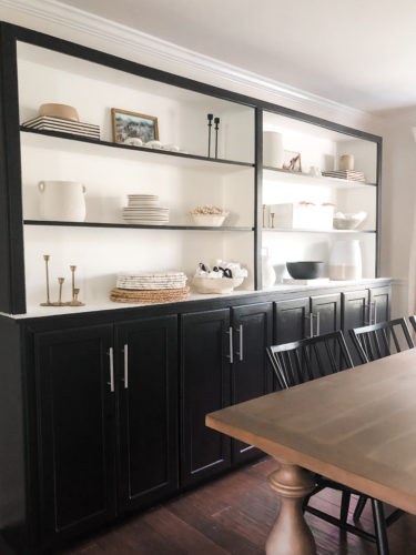 Tips for simple and modern bookcase styling using black, white and cream tones. #modernbookcasestyling #bookcasestyling