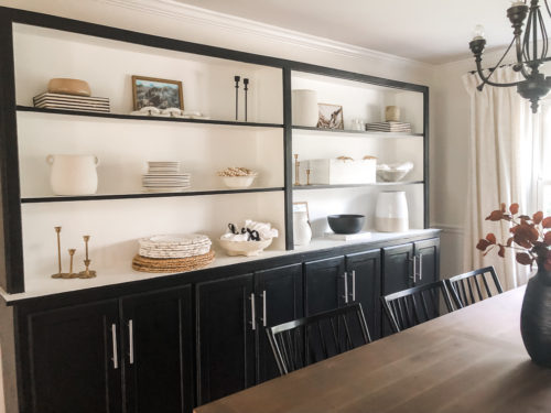 Tips for simple and modern bookcase styling using black, white and cream tones. #modernbookcasestyling #bookcasestyling