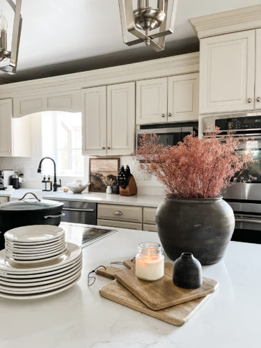 Refresh your kitchen countertops using these tips for kitchen counter styling! #kitchencounterstyling #kitchencounterdecor