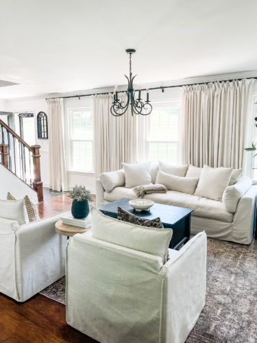 Sophisticated living room tour primarily using the the colors black and white. #sophisticatedlivingroom #blackandwhitelivingroom #loloirugs #marlydiceblog