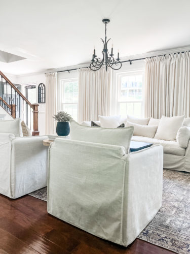 Sophisticated living room tour primarily using the the colors black and white. #sophisticatedlivingroom #blackandwhitelivingroom #loloirugs #marlydiceblog