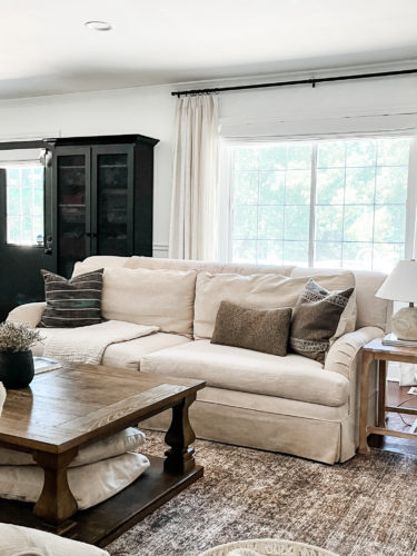 Black and white bookcase with vintage style decor