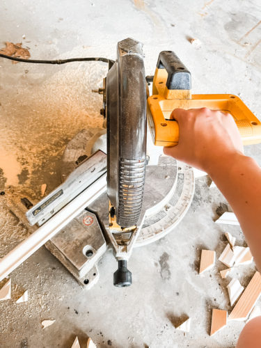 Learn how to install DIY wall moulding AKA picture frame moulding in this step-by-step process, which includes video! #diywallmoulding #pictureframemoulding