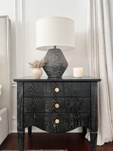 Black and white transitional primary bedroom with picture frame moulding #primarybedroom #transitionalbedroom #blackandwhitebedroom #modernbedroom