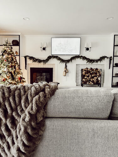 Cozy fireplace mantel decorations that are easy and simple to do! Moody christmas mantel accents, fireplace mantel decorations for the holidays! #christmasmanteldecor #christmasmantle #cozyfireplace
