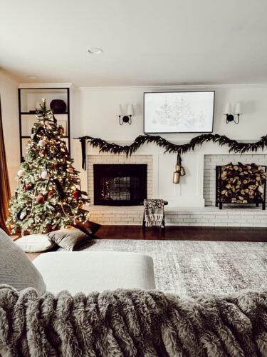 Cozy fireplace mantel decorations that are easy and simple to do! Moody christmas mantel accents, fireplace mantel decorations for the holidays! #christmasmanteldecor #christmasmantle #cozyfireplace