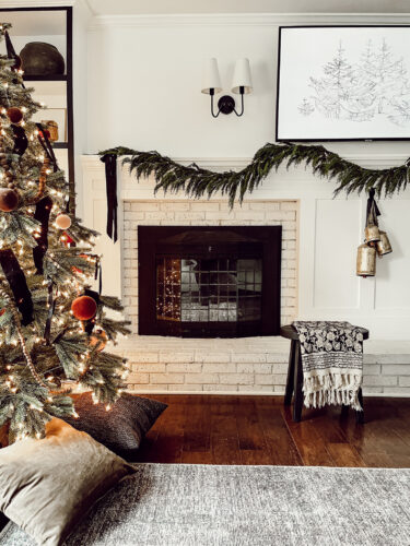 Cozy fireplace mantel decorations that are easy and simple to do! Moody christmas mantel accents, fireplace mantel decorations for the holidays! #christmasmanteldecor #christmasmantle #cozyfireplace