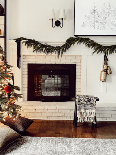 Cozy fireplace mantel decorations that are easy and simple to do! Moody christmas mantel accents, fireplace mantel decorations for the holidays! #christmasmanteldecor #christmasmantle #cozyfireplace