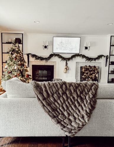 Cozy fireplace mantel decorations that are easy and simple to do! Moody christmas mantel accents, fireplace mantel decorations for the holidays! #christmasmanteldecor #christmasmantle #cozyfireplace