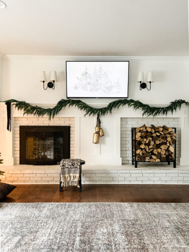 Cozy fireplace mantel decorations that are easy and simple to do! Moody christmas mantel accents, fireplace mantel decorations for the holidays! #christmasmanteldecor #christmasmantle #cozyfireplace