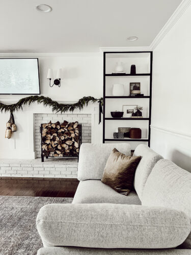 Cozy fireplace mantel decorations that are easy and simple to do! Moody christmas mantel accents, fireplace mantel decorations for the holidays! #christmasmanteldecor #christmasmantle #cozyfireplace