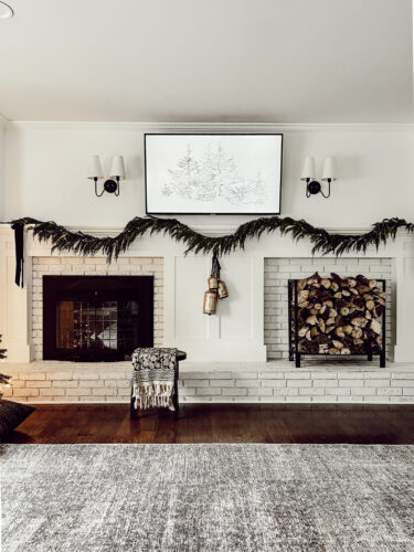 Cozy fireplace mantel decorations that are easy and simple to do! Moody christmas mantel accents, fireplace mantel decorations for the holidays! #christmasmanteldecor #christmasmantle #cozyfireplace