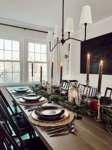 A holiday tablescape using red, brown and green #christmastablescape #christmastabledecorations #holidaytablescape #marlydiceblog