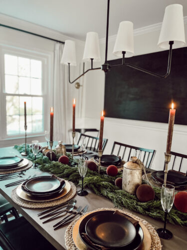 A holiday tablescape using red, brown and green #christmastablescape #christmastabledecorations #holidaytablescape #marlydiceblog