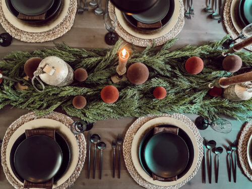 A holiday tablescape using red, brown and green #christmastablescape #christmastabledecorations #holidaytablescape #marlydiceblog