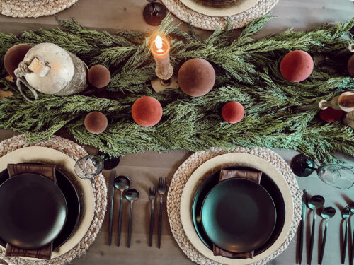 A holiday tablescape using red, brown and green #christmastablescape #christmastabledecorations #holidaytablescape #marlydiceblog