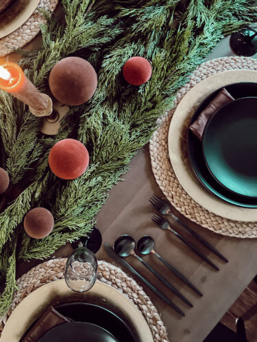 A holiday tablescape using red, brown and green #christmastablescape #christmastabledecorations #holidaytablescape #marlydiceblog