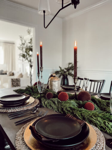 A holiday tablescape using red, brown and green #christmastablescape #christmastabledecorations #holidaytablescape #marlydiceblog