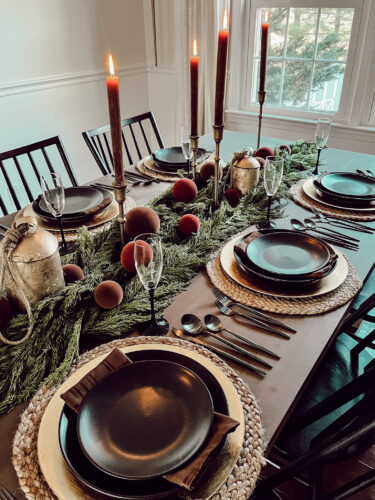 A holiday tablescape using red, brown and green #christmastablescape #christmastabledecorations #holidaytablescape #marlydiceblog